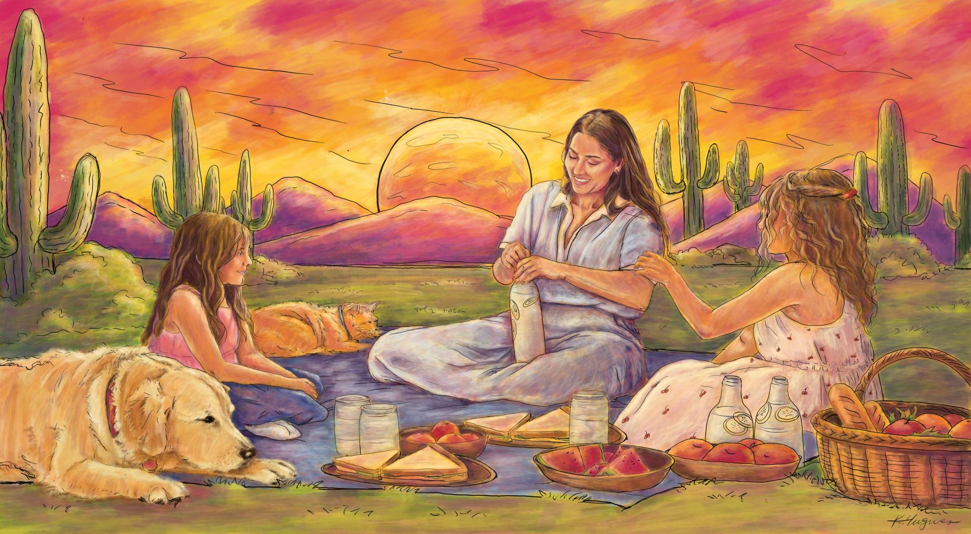 A woman and two girls picnic on a blanket in the desert at sunset, with a golden retriever lying beside them.